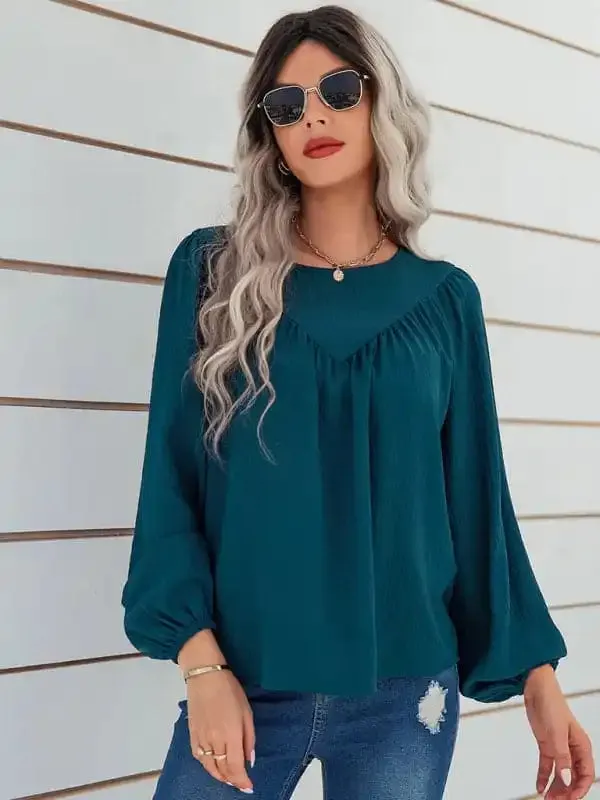 Women’s casual loose round neck solid color pullover shirt