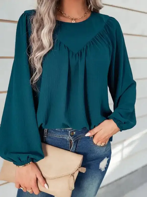 Women’s casual loose round neck solid color pullover shirt